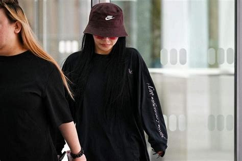 Socialite Kim Lim appears at State Courts to support .
